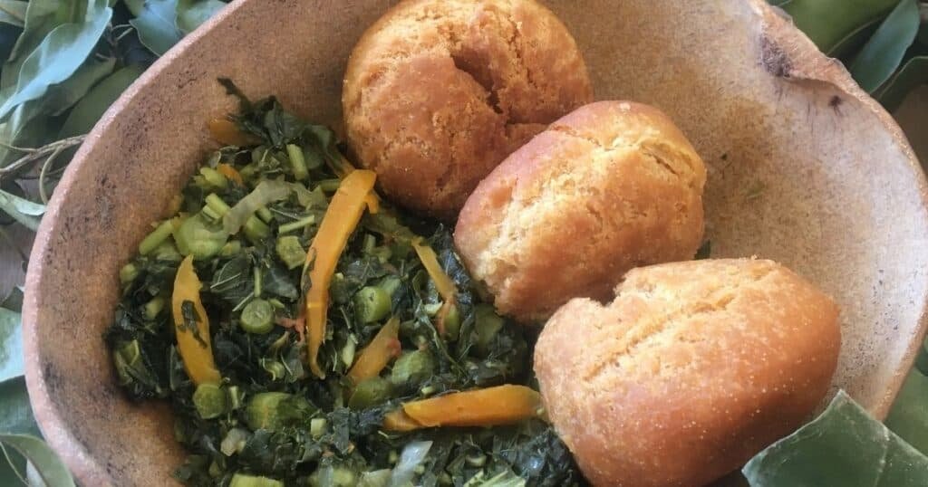 Steam Callaloo with Fried Dumplings in Calabash